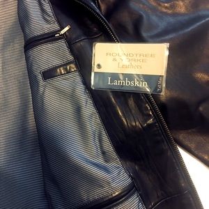 Beautiful lamb jacket. Pockets inside, nice lining, zipper closing.